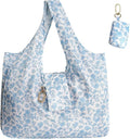 Floral foldable keychain tote bag folded into compact pouch